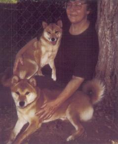 This is Red Sonia and Beni hanging out with Susan in the front yard.